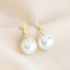Large Mismatched Crystal Star and Moon Pearl Drop Earrings
